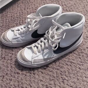 Nike White Sneakers with Black Logo